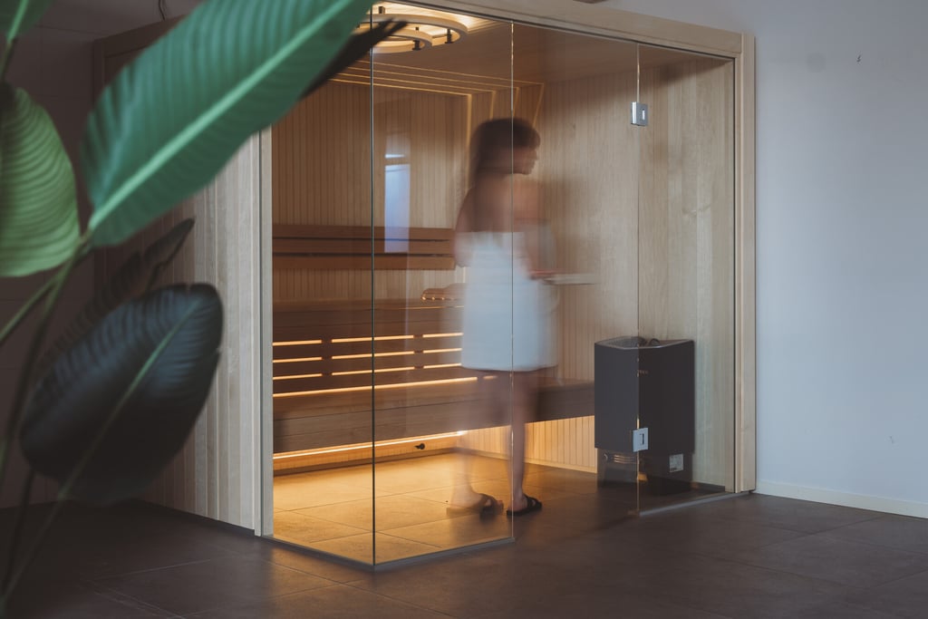  A woman in a Harmony sauna room
